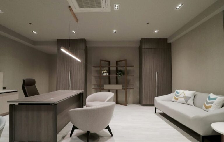 Executive office fit-out with full-height timber-finish storage units and desk